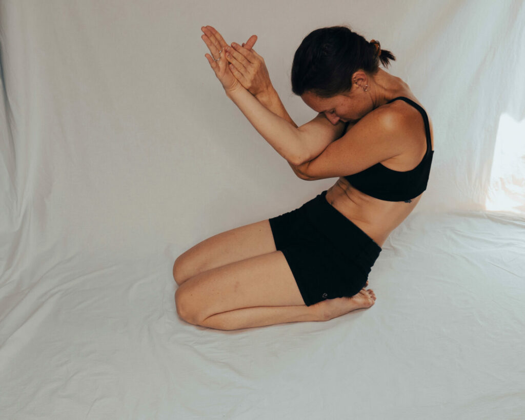 Marta in Garudasana Yin Version