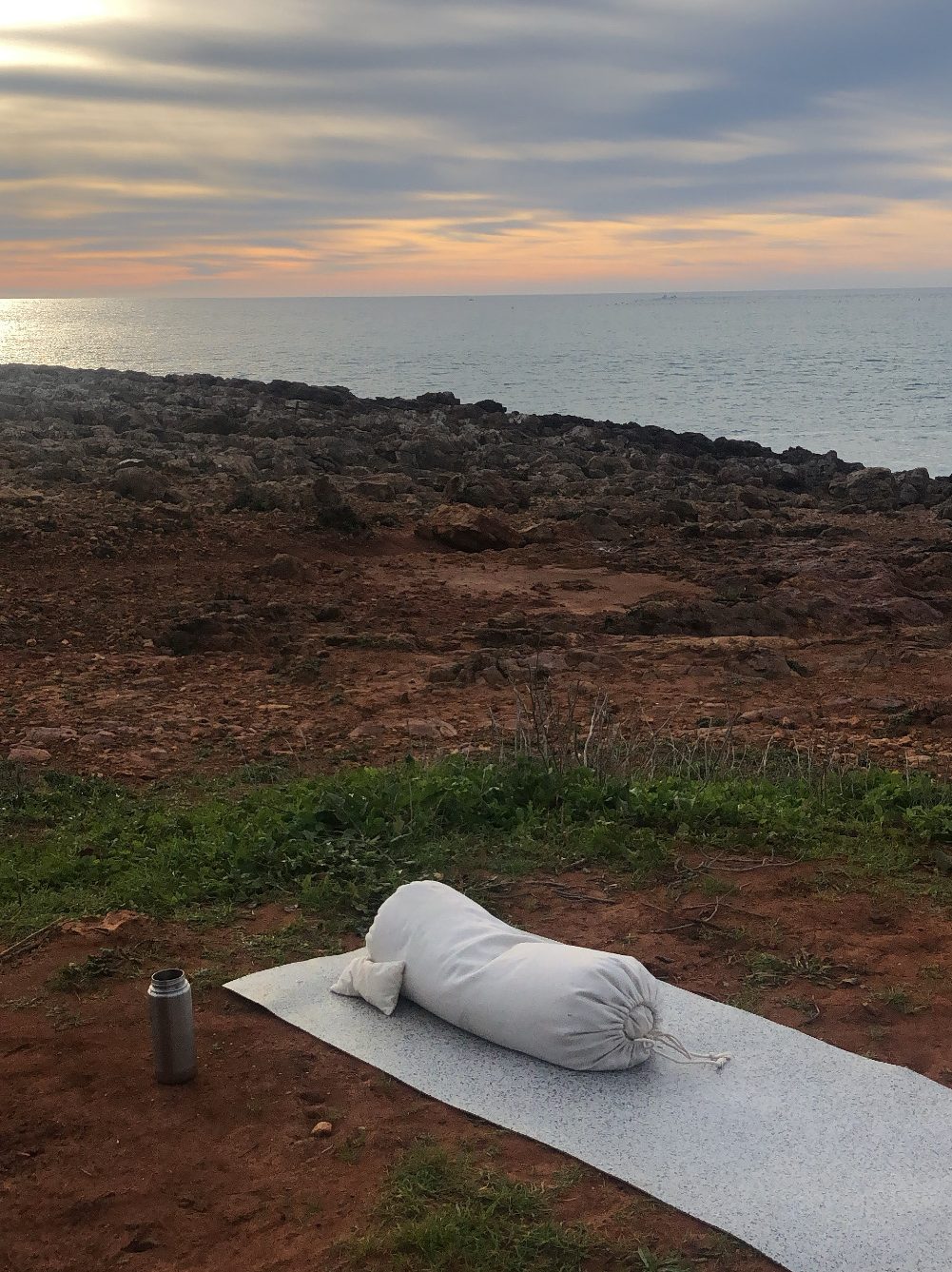 Incredible views during an outdoor yoga class, one of the reasons we love yoga when we travel